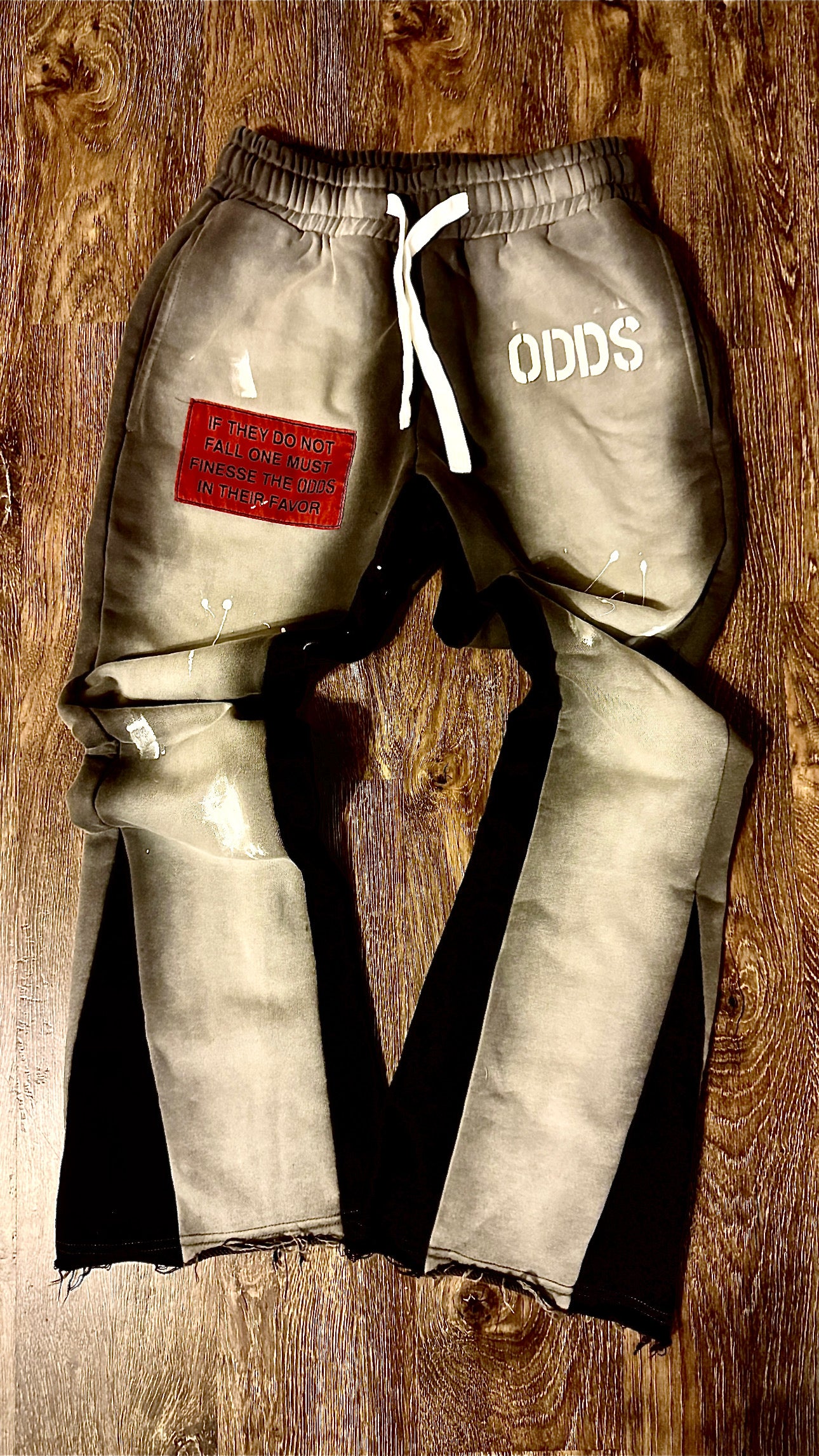 FINESSE THE “ODDS” FLARED SWEATPANTS