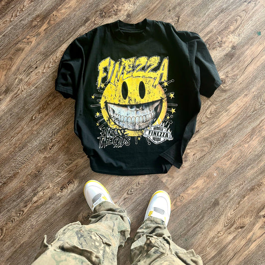BOXY “FINESSE THE ODDS” OVERSIZED SMILEY TEE